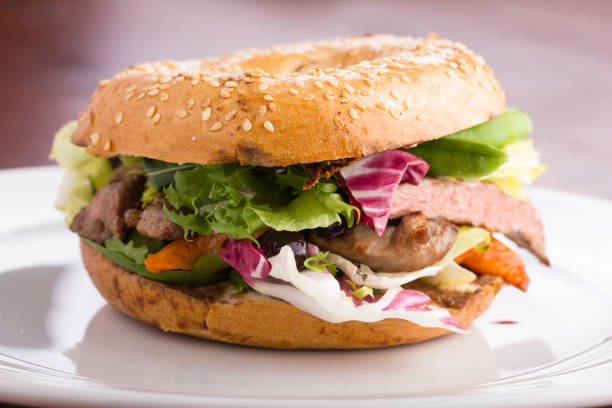 Duck meat bagel. stock photo