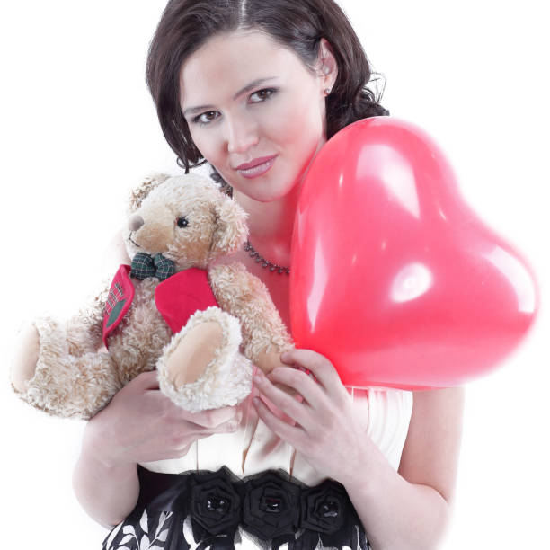 istock beautiful girl with a gift from a loved one 906651680