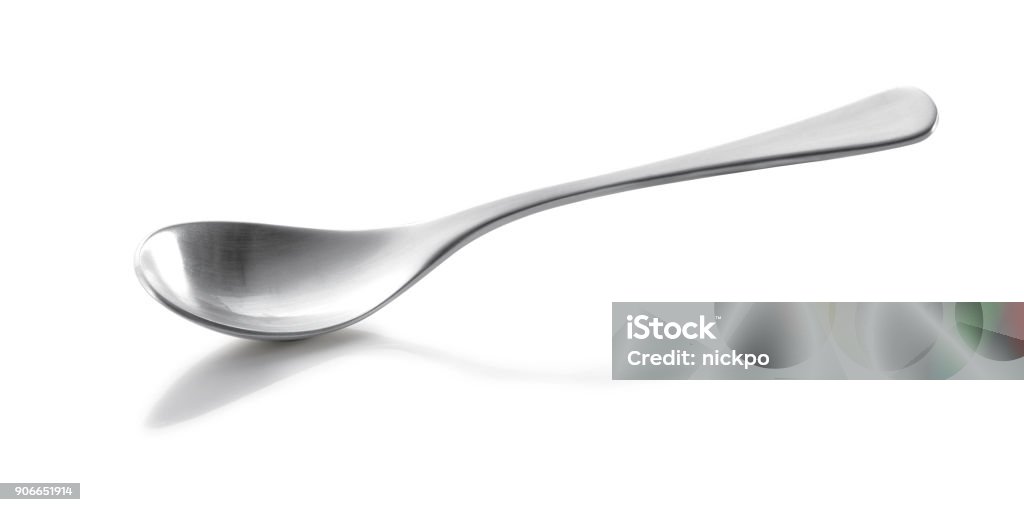 spoon close-up isolated on  white background metal spoon close-up isolated on  white background White Background Stock Photo