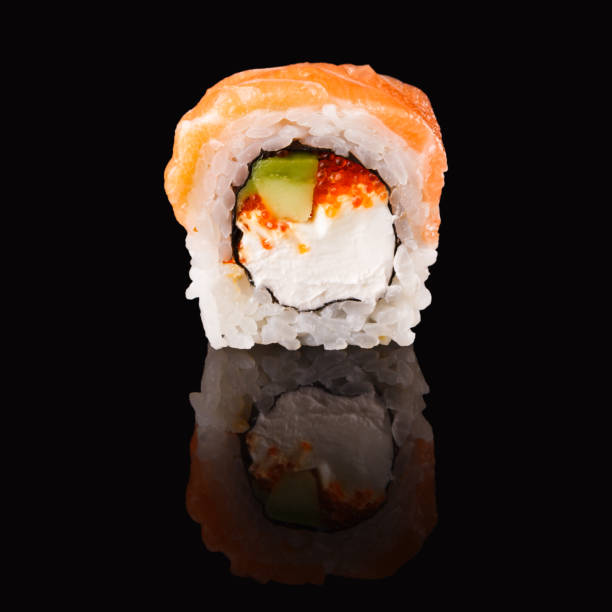 istock Japanese roll on black mirroring background 906655884