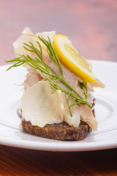 Tartine with smoked trout. stock photo