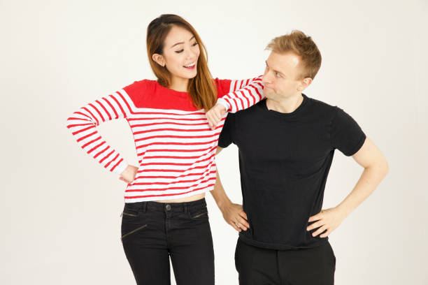 istock Attractive inter racial couple being close together 906687082