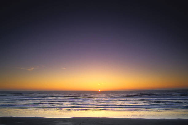 simple beach sunset  ebb and flow stock pictures, royalty-free photos & images