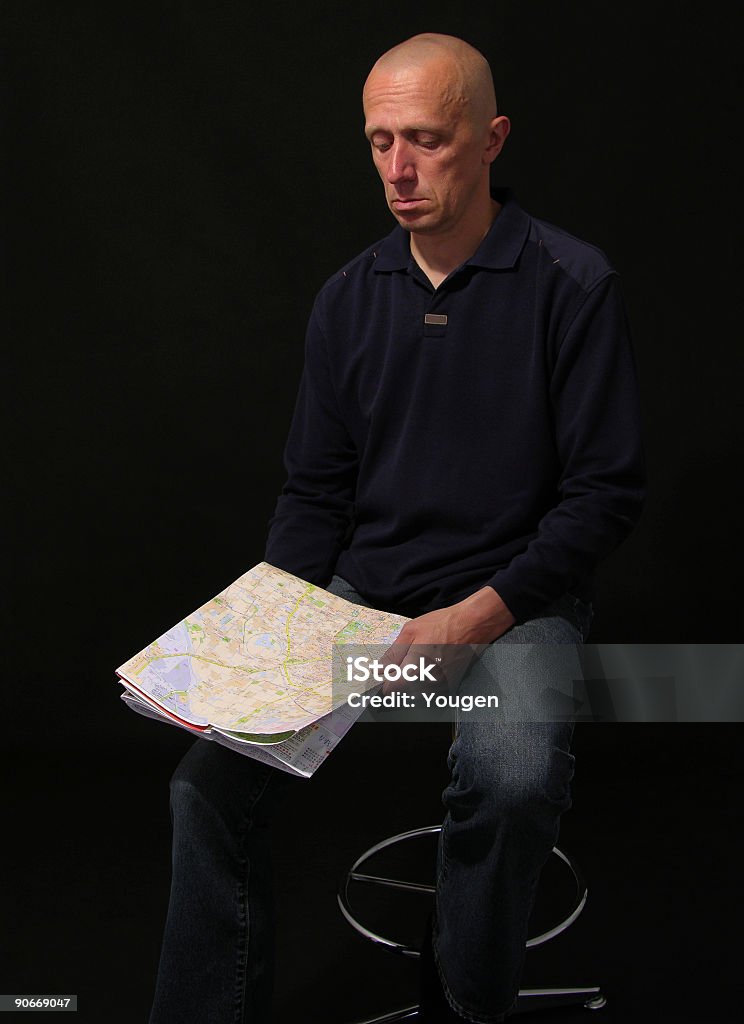 The man has thought of a map  Adult Stock Photo