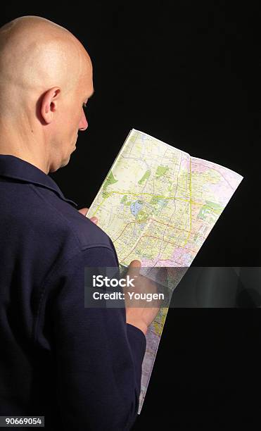 The Man Look Into A Map In The Chinese Language Stock Photo - Download Image Now - Adult, Black Color, Blood Flow