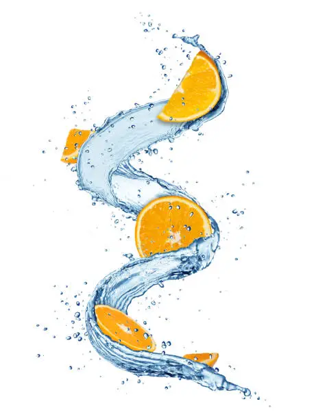 Pieces of orange fruit in water splashes. Fresh drink concept. High resolution image isolated on white background