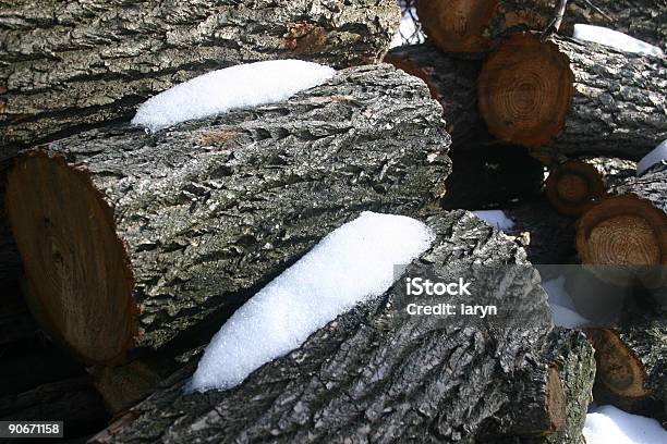 Wood Pile With Snow Stock Photo - Download Image Now - Aging Process, Burning, Color Image