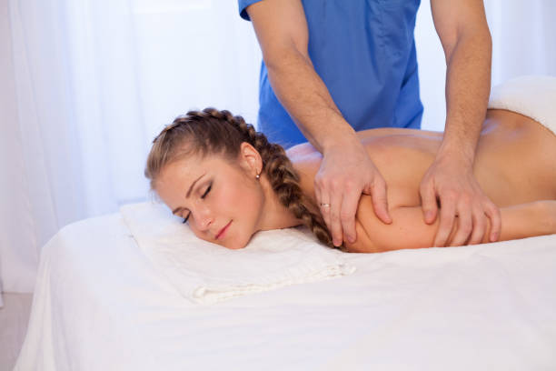 istock a woman doing a back massage in the Spa 1 906724224