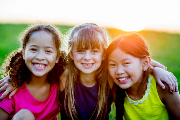 istock Girls In A Park 906726514