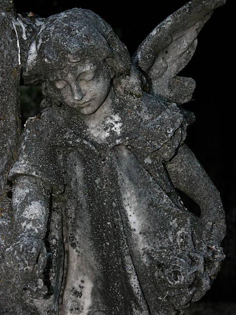 istock Angel Headstone with lichen 90672758