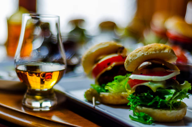 mini burgers with meat, vegetables, cheese and other toppings, bread sprinkled with sesame seeds, mini fast food mini burgers with meat, vegetables, cheese and other toppings, bread sprinkled with sesame seeds, mini fast food, tasty set spanish hamburger stock pictures, royalty-free photos & images