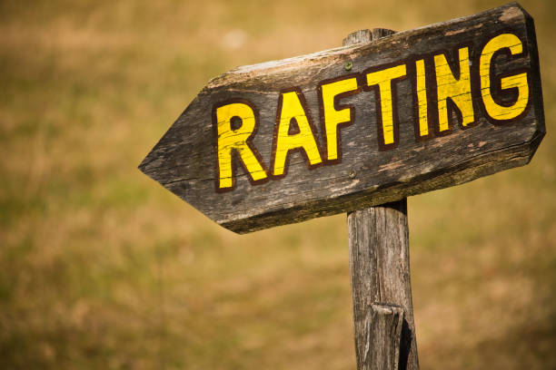 istock wooden board sign for rafting 906735562