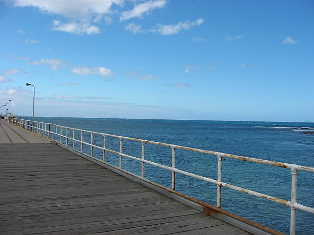istock Long wharf extending out to sea 90673739
