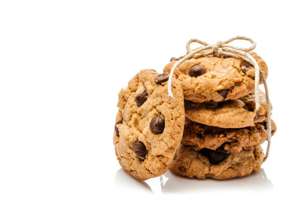 Five homemade chocolate chip cookies isolated on white background