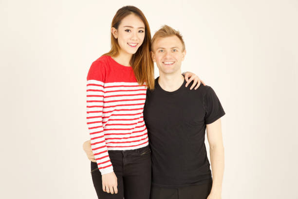 istock Attractive inter racial couple being close together 906741192