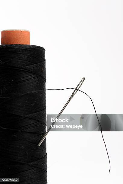 Black Thread With A Needle On An Ancient Antique Old Wooden Coil Closeup  White Background Stock Photo - Download Image Now - iStock