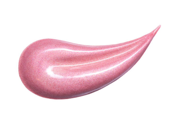 istock Lip gloss sample isolated on white. Smudged pink lipgloss. 906758188