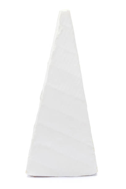istock Piece of brie or camambert cheese on a white background 906759048