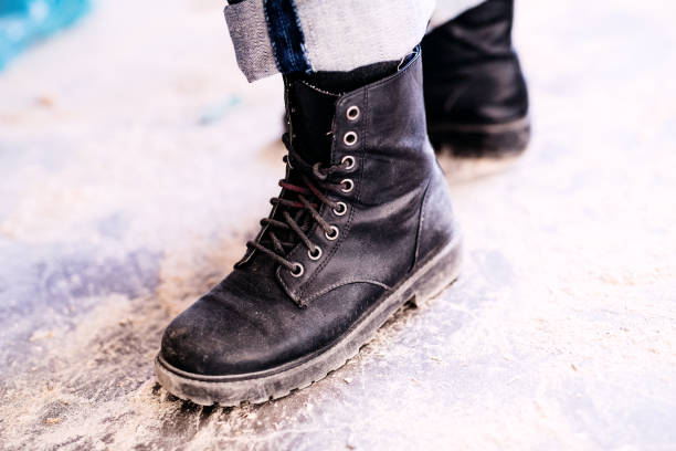 istock Legs of a woman worker. 906761698