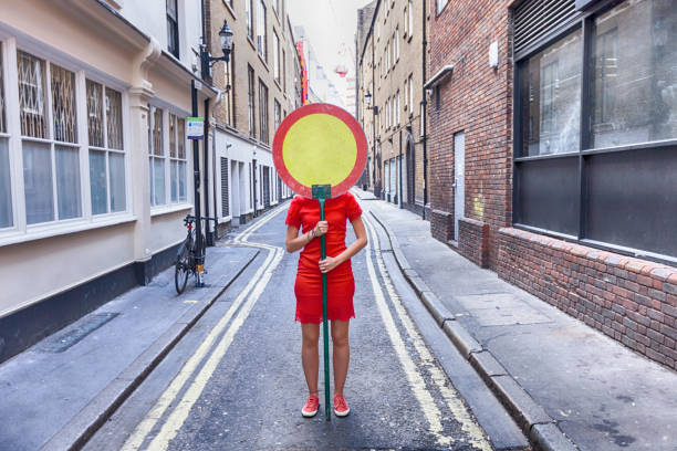 Woman and warning sign Stop. Concept for women rights and gender equality.