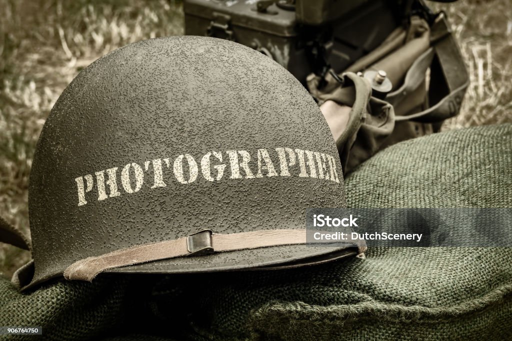 Old helmet of a war photographer Retro styled image of an old helmet of a war photographer Journalist Stock Photo