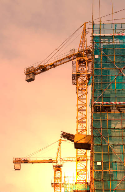 istock Hanging tower at construction site, building skyscrapers 906765446