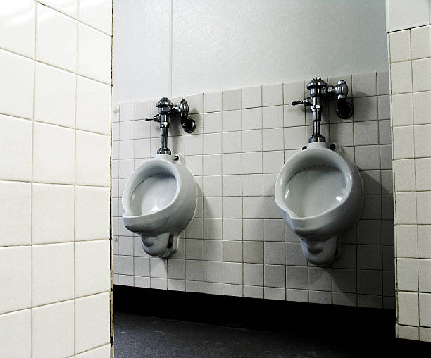 istock Two Urinals In A Public Restroom 90676602