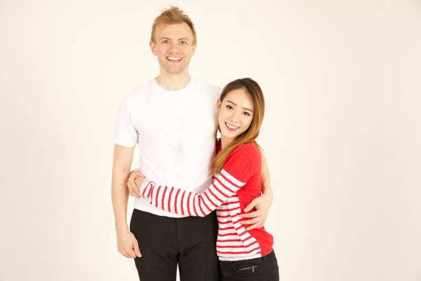 istock Attractive inter racial couple being close together 906766126
