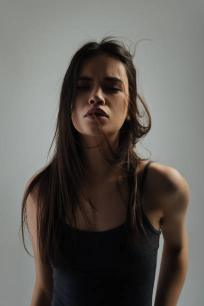istock Nice earnest young woman staring 906766802