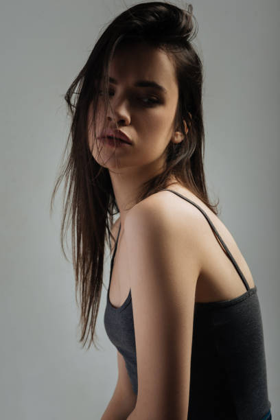 istock Nice concentrated woman wearing a top 906769254