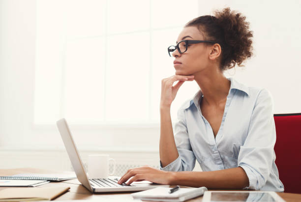 istock Business woman working on laptop at office 906769710