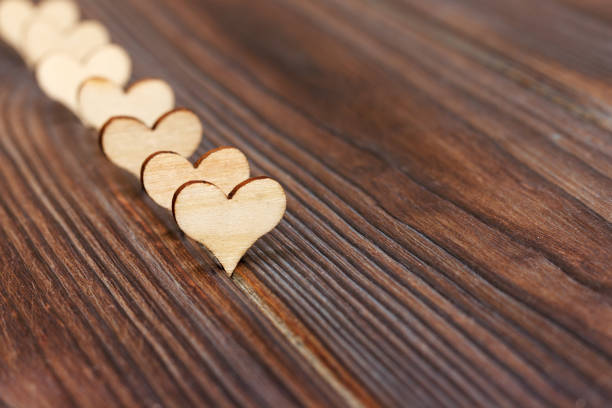 Wooden heart shape background. copy space love concept.