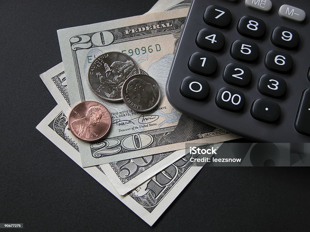 Calculator and Money  American One Hundred Dollar Bill Stock Photo