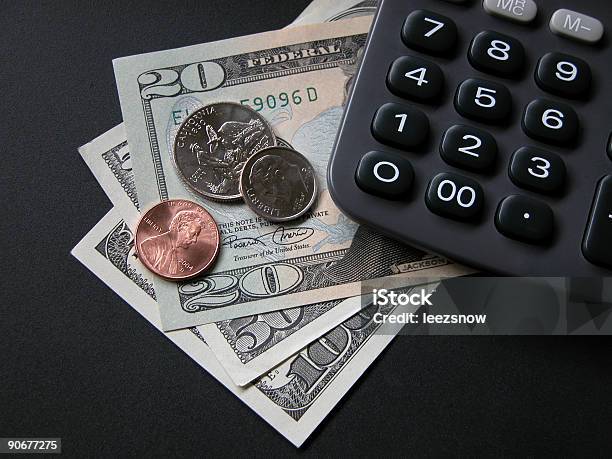 Calculator And Money Stock Photo - Download Image Now - American One Hundred Dollar Bill, Black Background, Calculating