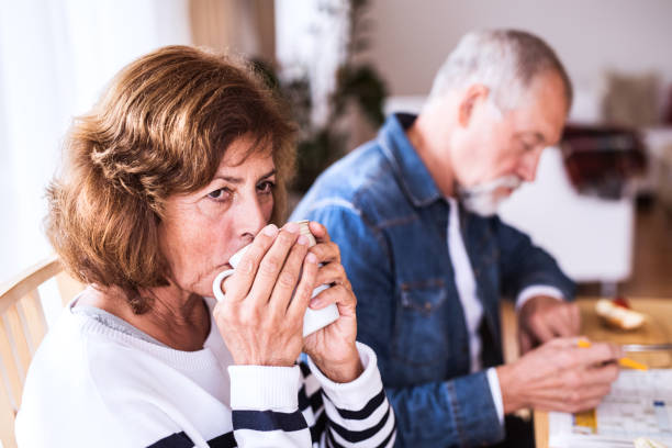 istock Senior couple relaxing at home. 906772992