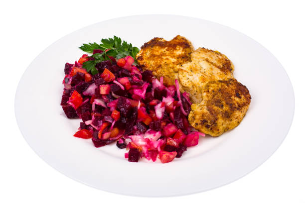 Plate with beetroot salad and grilled chicken fillet
