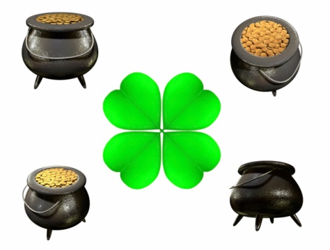Different St.Patrick's Day accessories on yellow background