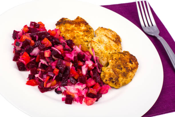 Plate with beetroot salad and grilled chicken fillet
