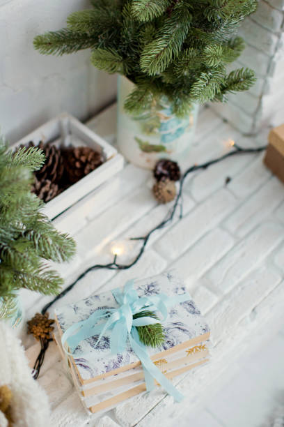 istock books with spruce and lights 906777094
