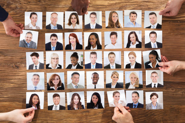 istock Businesspeople Selecting The Candidate Portrait Photo 906777460