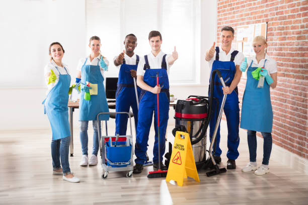 istock Portrait Of Diverse Janitors Showing Thumb Up Sign 906777510