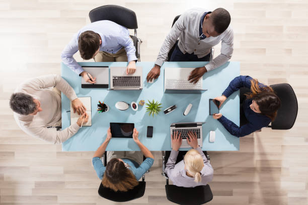 istock Group Of Businesspeople Working In Office 906778378