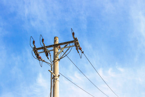 istock Power poles and resistance transformers in the city 906778518