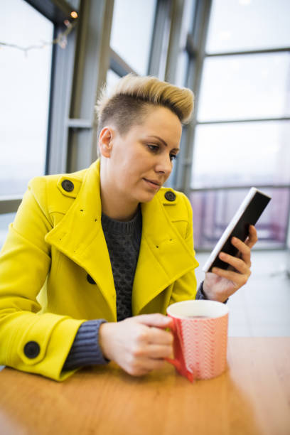 istock Woman use your break at work to drink coffee and chat 906783246