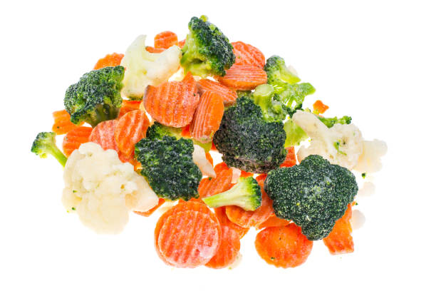 istock Mix of frozen vegetables on white background 906783410