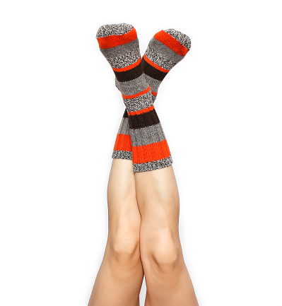 Female feet in warm socks