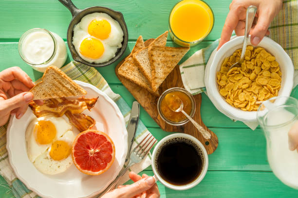 istock Family having summer breakfast, top view 906786272