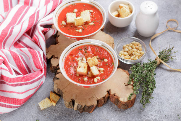 istock Delicious hot or cold tomato soup with croutons 906790852