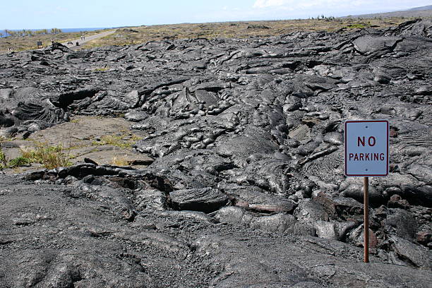 istock Road Blocked - Lava flow buries the car park 90679746