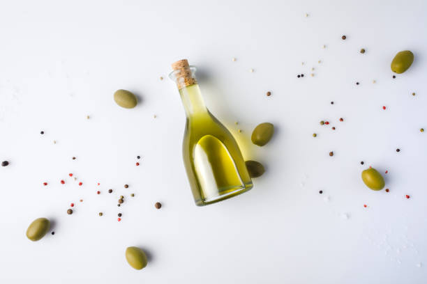 istock olive oil bottle with cork and olives 906798302